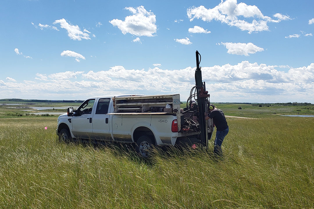 Matthew Robertson collecting soil samples at St. Denis, Sask. (Photo: Submitted)