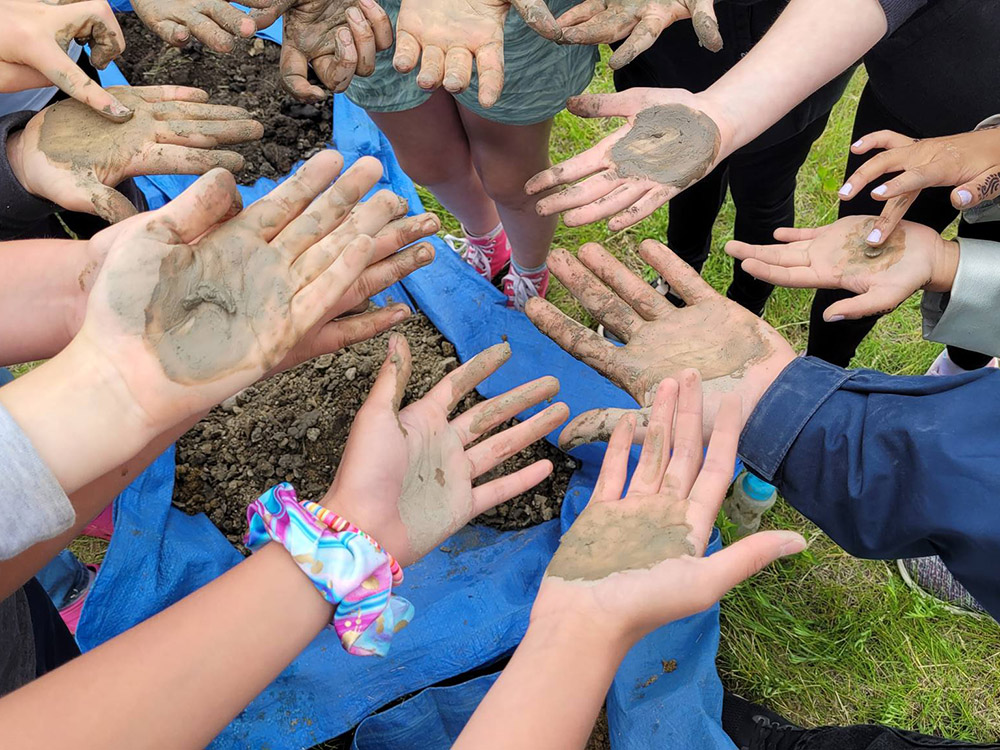Soil texturing on hands